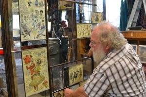 Cain Inc. Wayne Cain Billy Ireland Cartoon Library Museum Installing Panels Into Frame