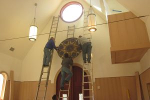 Cain Inc. Wayne Cain Installing Stained Glass Charlottesville VA